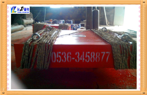 除鐵器，懸掛式除鐵器，懸掛式除鐵器物料中的鐵磁雜物吸附